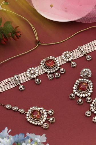 Rich maroon color choker kundan necklace set perfect for luxurious bridal style