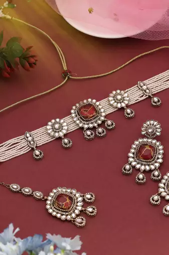 Rich maroon color choker kundan necklace set perfect for luxurious bridal style