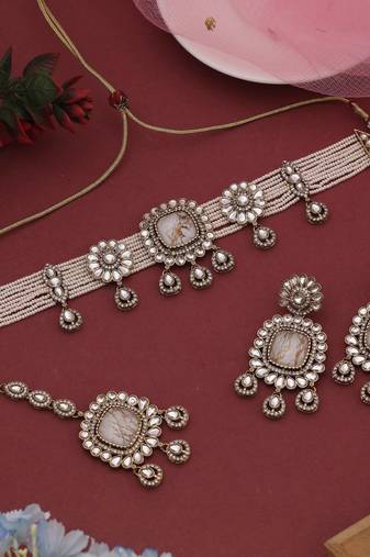 Classic white color choker kundan necklace set ideal for elegant ceremonial moments
