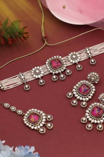 Bold magenta color choker kundan necklace set adding charm to your special occasions