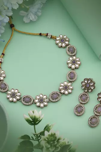 Soft light purple color kundan necklace set featuring delicate details for graceful styling
