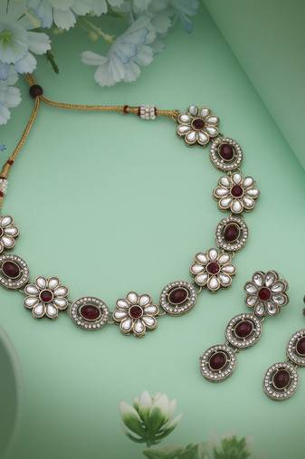 Traditional maroon color kundan necklace set created for sophisticated ethnic fashion lovers