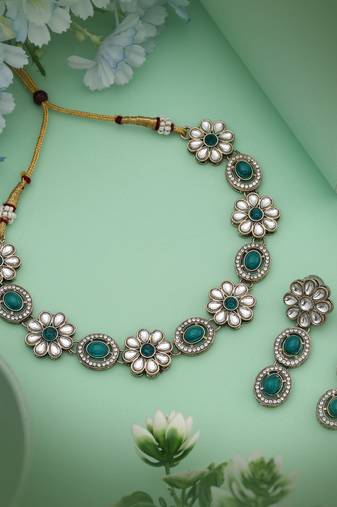 Regal rama green color kundan necklace set designed to elevate your ethnic collection