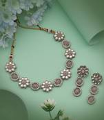 Lovely peach color kundan necklace set crafted to complement soft and elegant attire