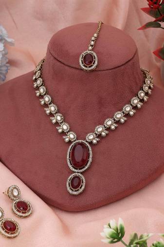 Radiant rani color kundan necklace set offering bold beauty for cultural celebrations