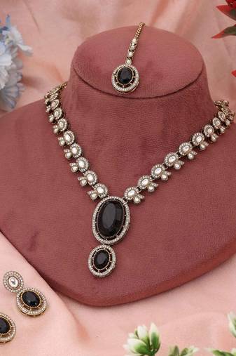 Premium black color kundan necklace set perfect for bold and contemporary ethnic fashion