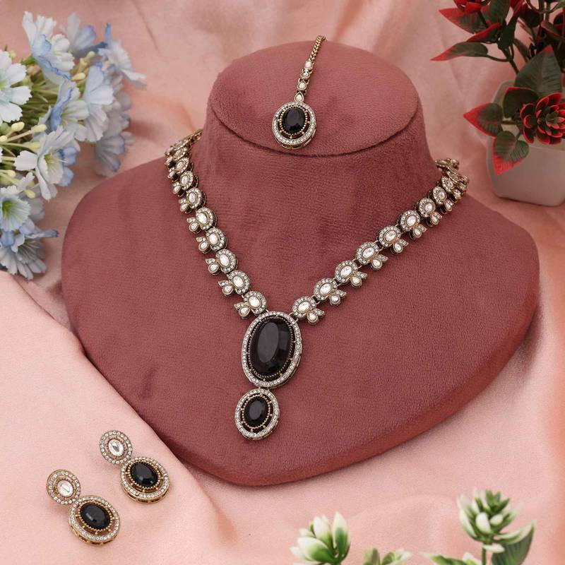 Premium black color kundan necklace set perfect for bold and contemporary ethnic fashion