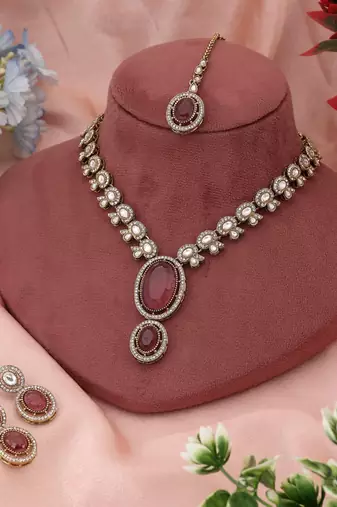 Graceful pink color kundan necklace set created to complement feminine festive attire