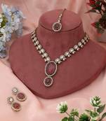 Graceful pink color kundan necklace set created to complement feminine festive attire
