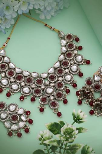 Royal maroon color kundan necklace set designed for luxurious traditional statement wear