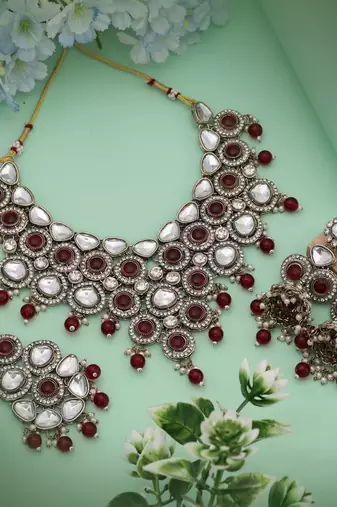 Royal maroon color kundan necklace set designed for luxurious traditional statement wear