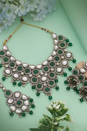 Gorgeous green color kundan necklace set crafted for timeless festive and ceremonial style