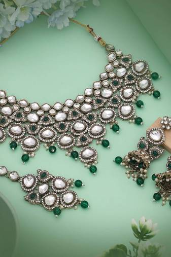 Charming green color kundan necklace set highlighting rich tones for ethnic sophistication