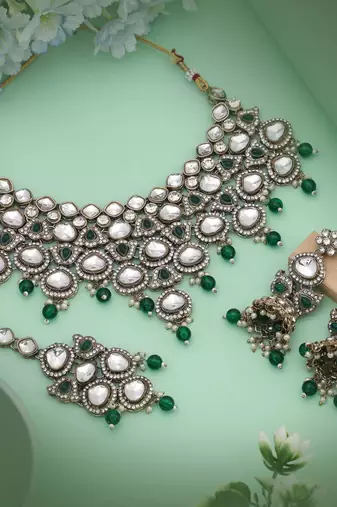 Charming green color kundan necklace set highlighting rich tones for ethnic sophistication