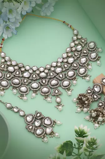 Pure white color kundan necklace set ideal for sophisticated wedding and festive styling
