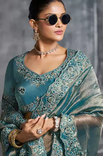 Aqua blue premium tissue zari resham thread embroidery with pearls, mirror work stone work saree with blouse