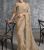 Beige premium tissue zari resham thread embroidery with pearls, mirror work stone work saree with blouse
