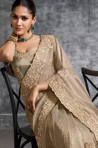 Beige premium tissue zari resham thread embroidery with pearls, mirror work stone work saree with blouse