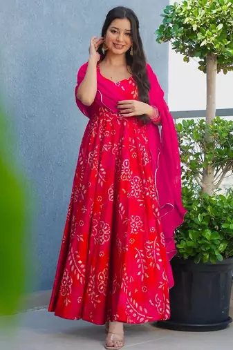 Red color beautiful printed partywear gown for trendy girls