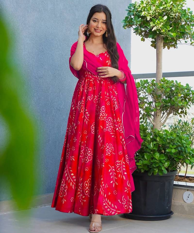 Red color beautiful printed partywear gown for trendy girls