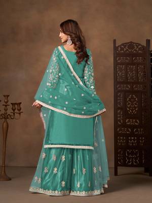 Sea green color elegant net fabric embroidered palazzo suit 2