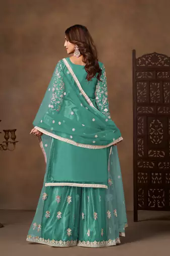 Sea green color elegant net fabric embroidered palazzo suit