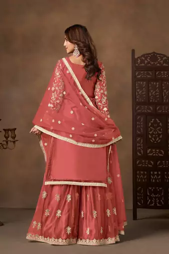 Peach color elegant net fabric embroidered palazzo suit