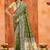 olive green color velvet tussar silk blend fabric partywear saree with paithani pallu and traditional ghatchola print