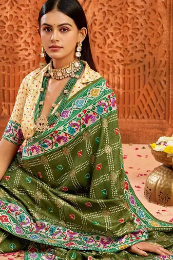 olive green velvet tussar silk blend partywear saree with paithani pallu and traditional ghatchola print