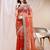 orange color banarasi crush fabric ethnic embroidered partywear saree
