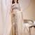beige color space silk blend fabric ethnic embroidered partywear saree