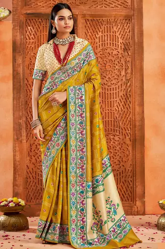 gold color velvet tussar silk blend fabric partywear saree with paithani pallu and traditional ghatchola print