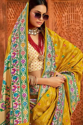 gold velvet tussar silk blend partywear saree with paithani pallu and traditional ghatchola print