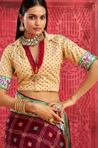 plum velvet tussar silk blend partywear saree with paithani pallu and traditional ghatchola print