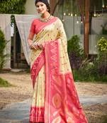 cream color soft silk blend fabric woven partywear saree