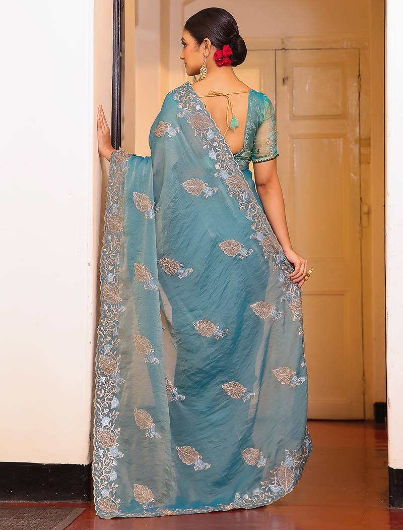 sky blue color tissue fabric embroidery work partywear saree