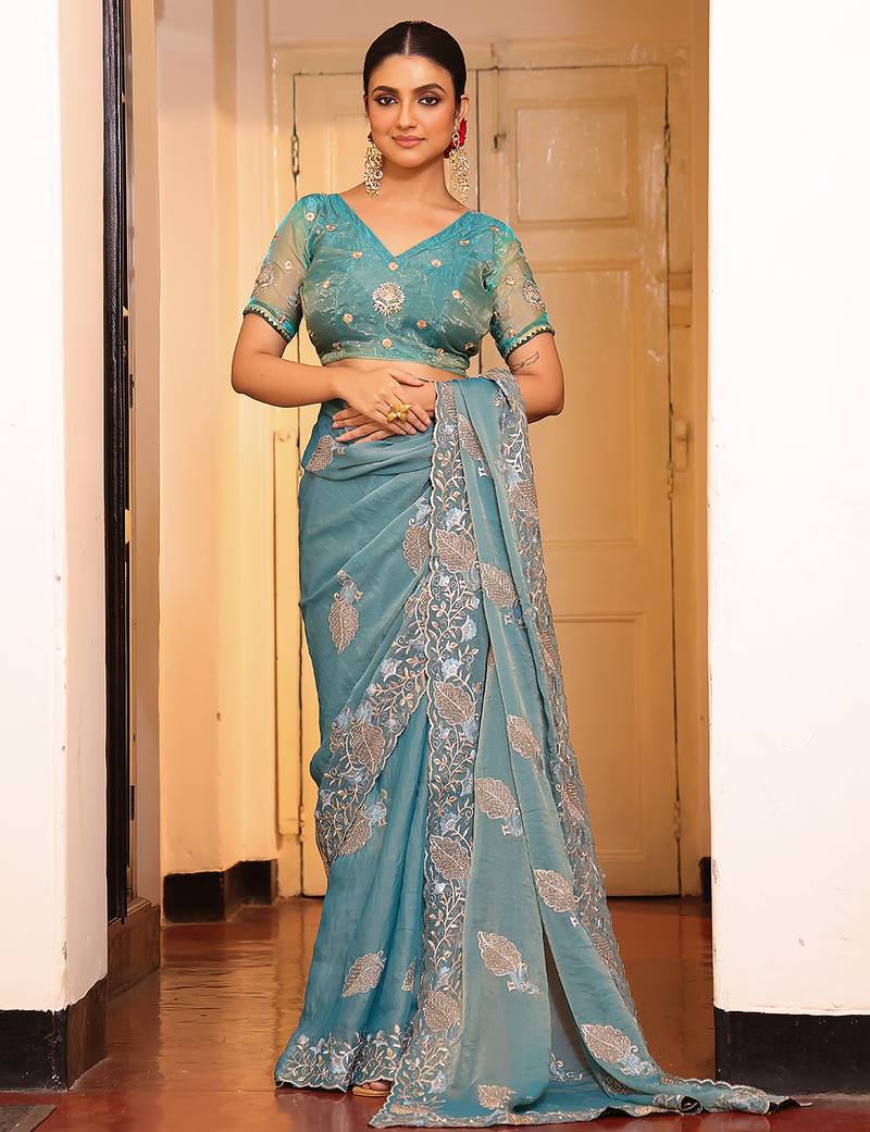 sky blue color tissue fabric embroidery work partywear saree
