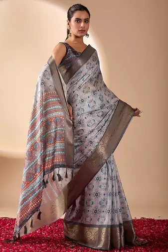 grey soft lichi silk blend sea green saree with abstract floral print & golden zari border