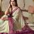 cream georgette saree with pink geometric print border & tassel detailing with blouse
