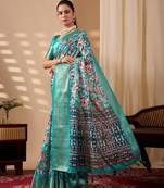 sea green lichi silk blend saree with abstract floral print & golden zari border