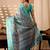 sea green lichi silk blend saree with abstract floral print & golden zari border