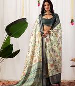 pista soft lichi silk blend saree with vibrant floral prints & intricate zari border
