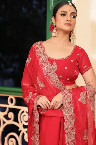 red embroidery work tissue ceremonial saree
