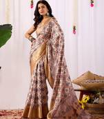 soft lichi silk blend saree with traditional geometric prints & golden zari border