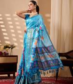 Serene sky blue lichi silk saree with lotus digital prints & golden zari border | matching contrast satin silk blouse