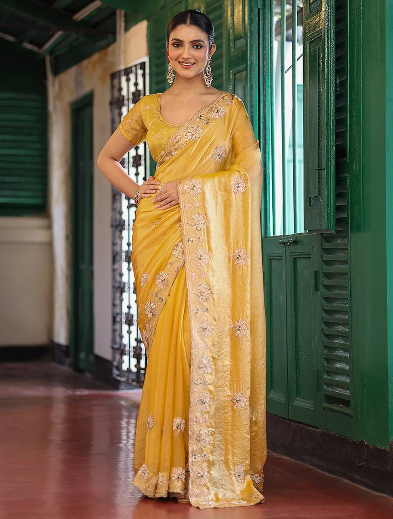 yellow color embroidery work tissue fabric beautiful ceremonial saree