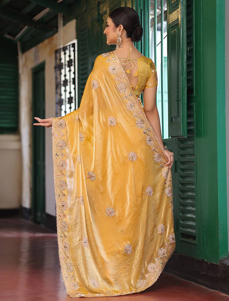 yellow color embroidery work tissue fabric beautiful ceremonial saree