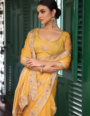 yellow embroidery work tissue ceremonial saree 3