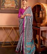 grey patola silk blend saree with traditional motifs & zari/contrast border | unstitched blouse
