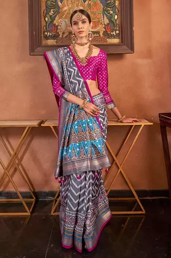 pink patola silk blend saree with traditional motifs & zari/contrast border | unstitched blouse